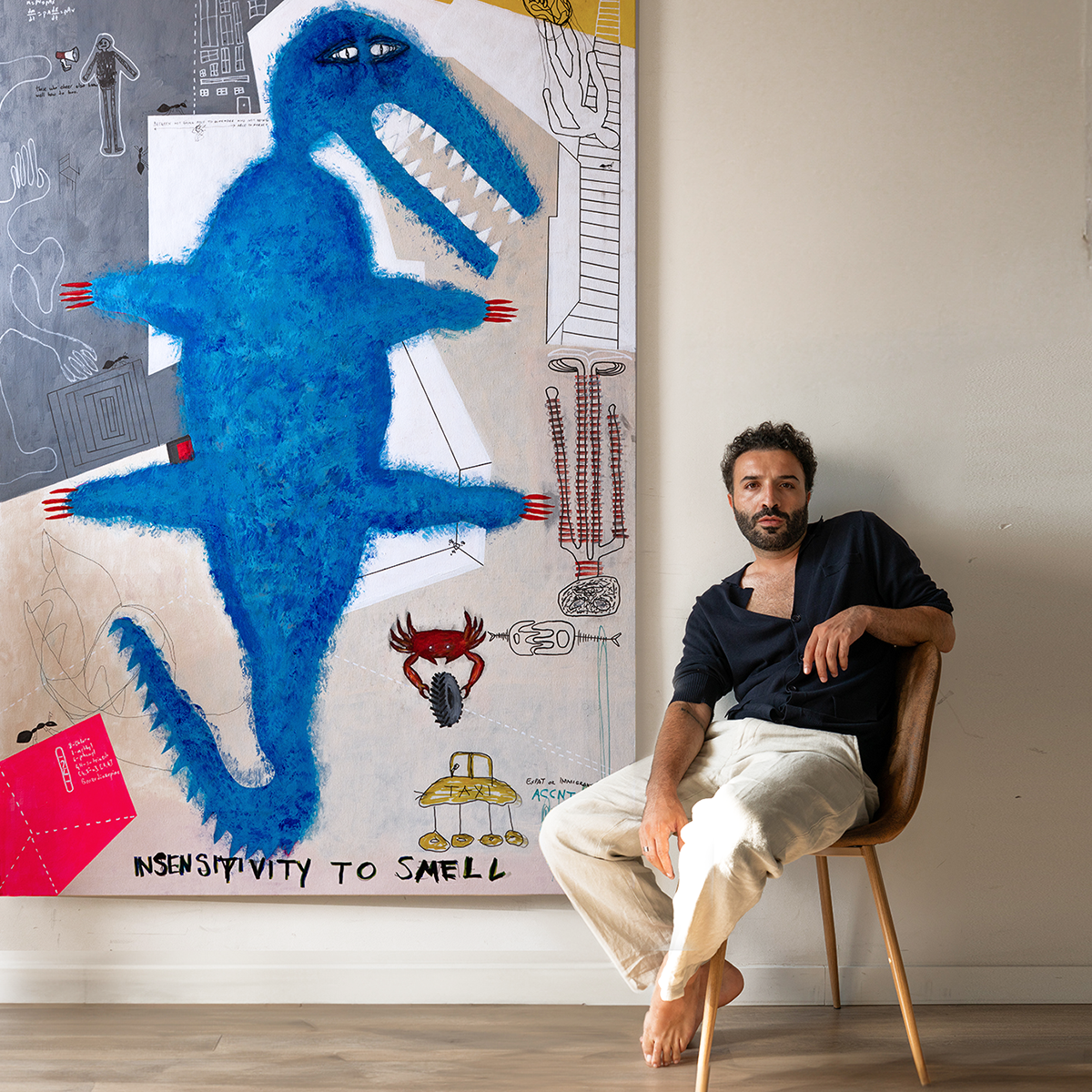 Ümit Sural with the painting Insensitivity to Smell